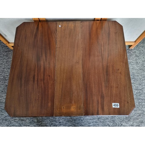 499 - A Good Quality Small Solid Walnut Drop Leaf Coffee Table with magazine rack inset to the centre base... 