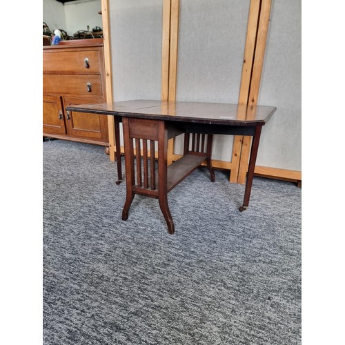 499 - A Good Quality Small Solid Walnut Drop Leaf Coffee Table with magazine rack inset to the centre base... 