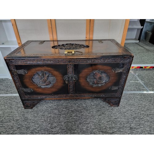 510A - Large very ornate camphorwood linen chest with decoration to the top of a bird scene, decoration of ... 