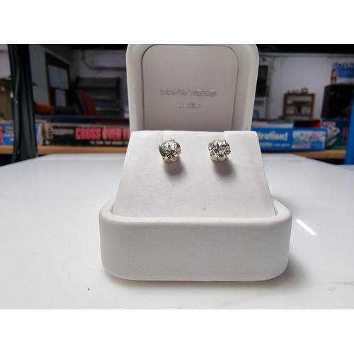 247 - A pair of 925 silver sparkly CZ stud earrings complete with butterfly backs in excellent clean condi... 