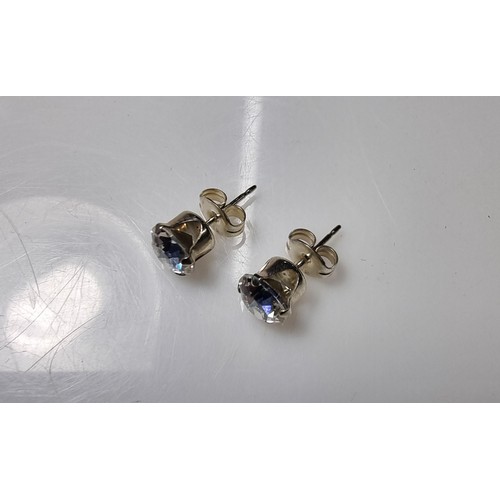 247 - A pair of 925 silver sparkly CZ stud earrings complete with butterfly backs in excellent clean condi... 