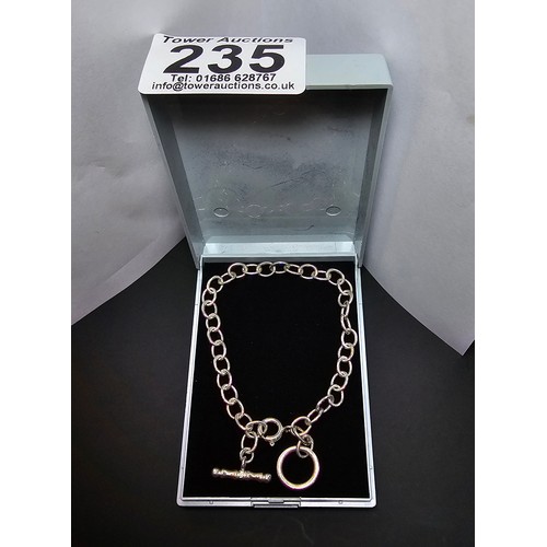 235 - 925 silver bracelet with a hoop and ball clasp and an additional clasp to fit smaller wrists ideal a... 