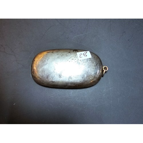 265 - A good quality antique hallmarked silver Vesta case of oblong shape having an ornate engraved design... 