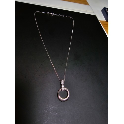 240 - 2x as new and unused silver plated necklaces inc 1x featuring an ornate pendant in the form of 2 rin... 