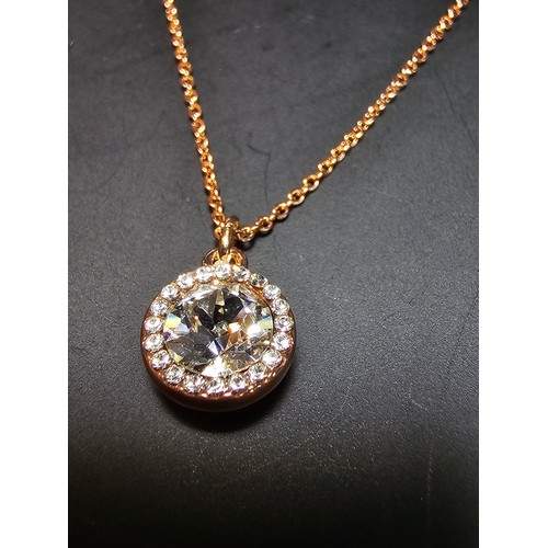 241 - brand new rose gold plated necklace with a large Swarovski crystal pendant st on an 18