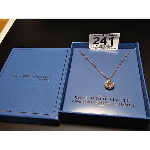 241 - brand new rose gold plated necklace with a large Swarovski crystal pendant st on an 18