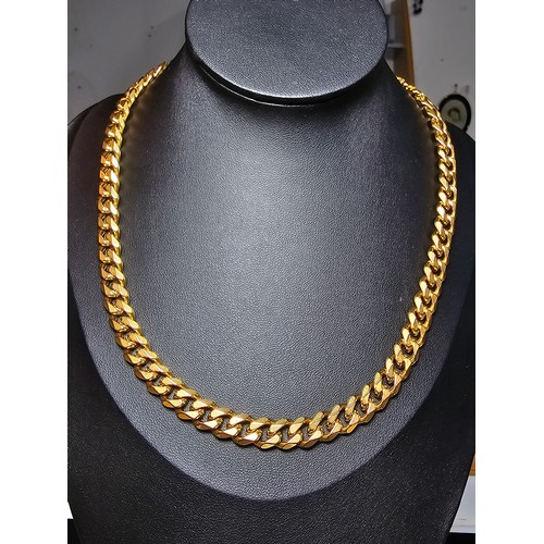 242 - A brand new and unused chunky 18ct gold plated curb link neck chain by Chains House Jewellery. Compl... 