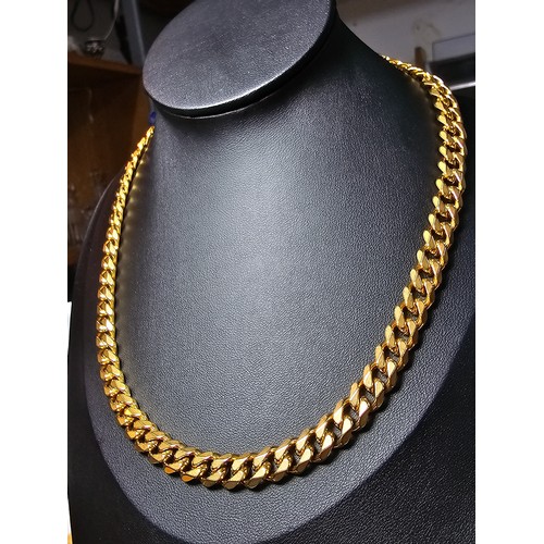 242 - A brand new and unused chunky 18ct gold plated curb link neck chain by Chains House Jewellery. Compl... 