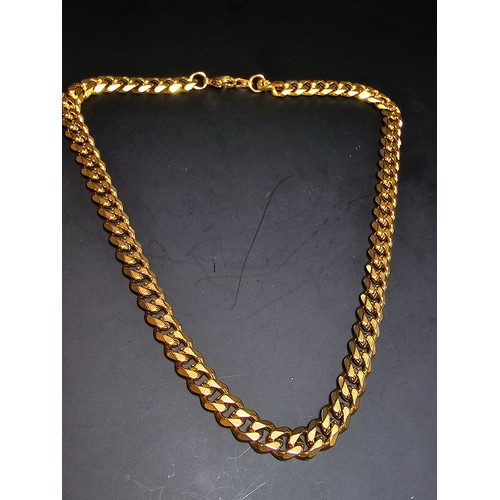 242 - A brand new and unused chunky 18ct gold plated curb link neck chain by Chains House Jewellery. Compl... 