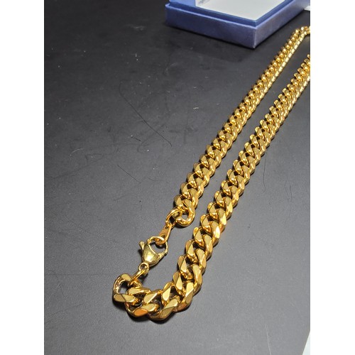 242 - A brand new and unused chunky 18ct gold plated curb link neck chain by Chains House Jewellery. Compl... 