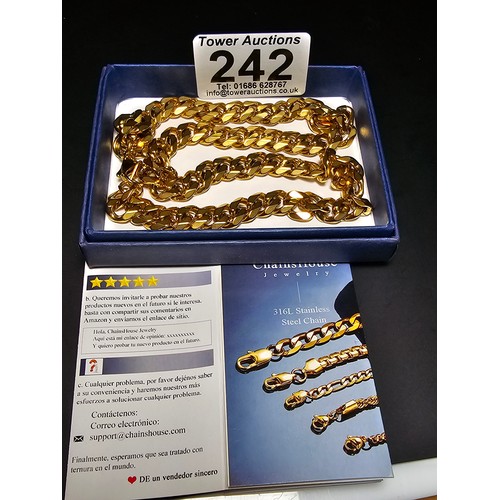 242 - A brand new and unused chunky 18ct gold plated curb link neck chain by Chains House Jewellery. Compl... 