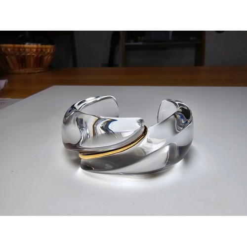 163 - A stunning fine quality crystal glass bangle by Baccarat from the coquillage collection featuring an... 