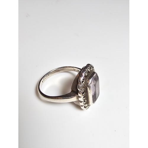 227 - Good quality vintage sterling silver dress ring inset with a faceted natural Kunzite gemstone with a... 