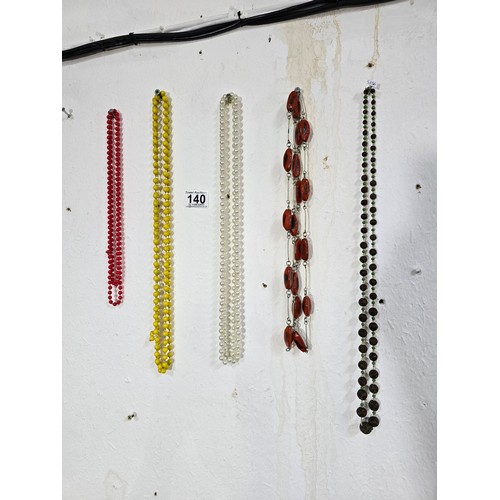 140 - Quantity of 5x good quality vintage beaded necklaces to include a vibrant yellow glass beaded hand k... 