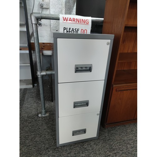 108A - A good quality 3 drawer filing cabinet, 2 drawers contain a quantity of divisions. Height of 97cm an... 