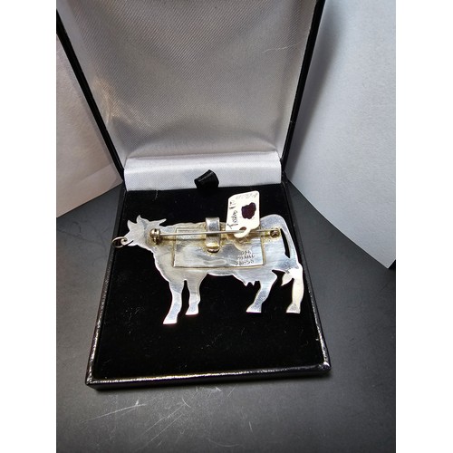 281 - An unusual vintage 925 silver Mexico large cow formed brooch made by Taxco. The cow features a ring ... 