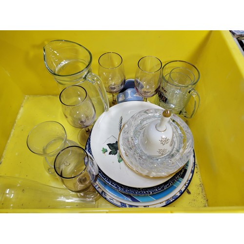 55A - 2x plastic tubs containing a quantity of collectable china and ceramics inc Bell's whiskey decanters... 