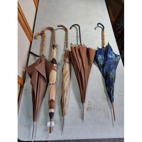 2 - Quantity of 5x vintage umbrellas most with cane handles inc a blue Monet style coloured umbrella