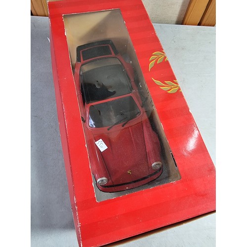 24 - Tonka Polistil 1:16 scale Porsche 911 Cabriolet in guards red, front wheels steer and doors and bonn... 