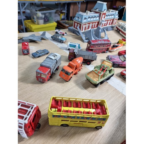 39 - Large collection of various diecast vehicles inc planes, busses, trucks, camper vans cars and racing... 