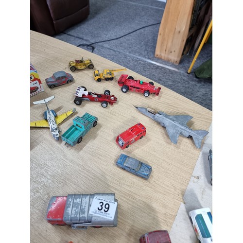39 - Large collection of various diecast vehicles inc planes, busses, trucks, camper vans cars and racing... 