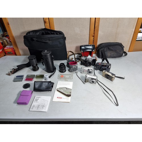 48 - Collection of cameras and accessories inc Praktica camera in leather case, Vivitar camera, Kodak 3.1... 