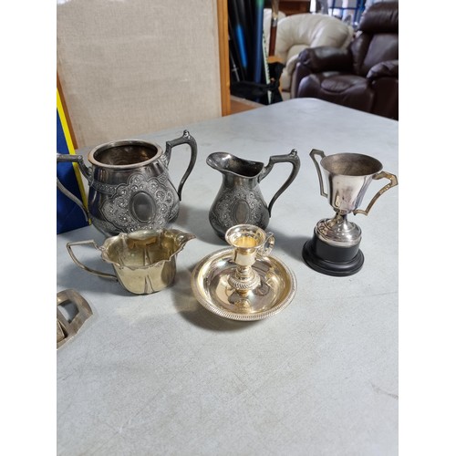 61 - Box containing a quantity of plated ware inc teapot, coffee pot, toast racks, tankards, vases, candl... 