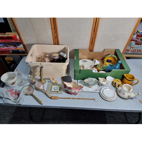 64 - 2x boxes of collectables inc brass candle sticks, dressing table set, old English sheepdog figures, ... 