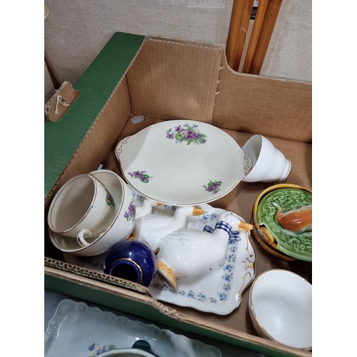 64 - 2x boxes of collectables inc brass candle sticks, dressing table set, old English sheepdog figures, ... 