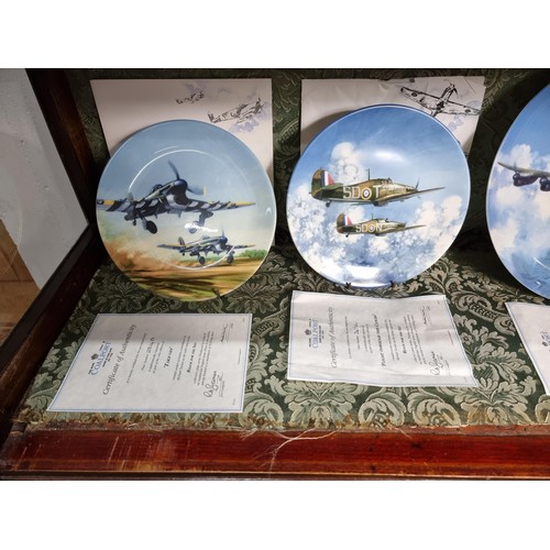 64A - Collection of 9x boxed Coalport reach for the sky collection plates all featuring military planes in... 