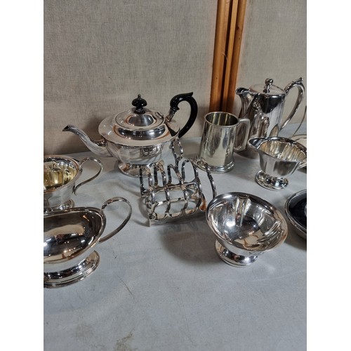 75 - Large collection of silver plated items inc teapot, coffee pot, water jug, milk jugs, gravy boats, s... 