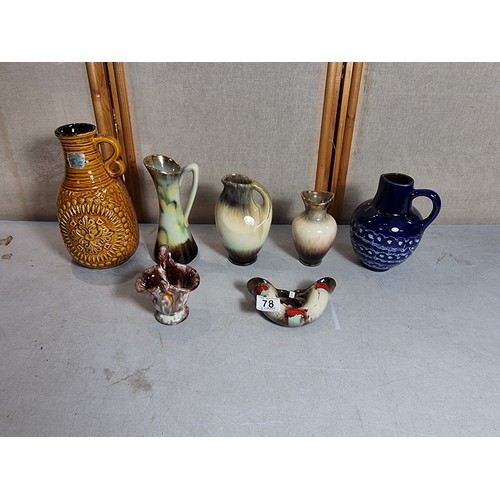 78 - Collection of collectable vases inc a West German vase, double horned vase, 3x cream and brown vases... 