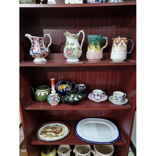 81 - Large collection of collectable china inc 4x jugs teapots cups and saucers, platters and vase, by Sa... 