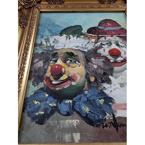 94 - Framed oil painting by William Moninet 1937 - 1999, depicting two clowns, in a gilt frame, painting ... 
