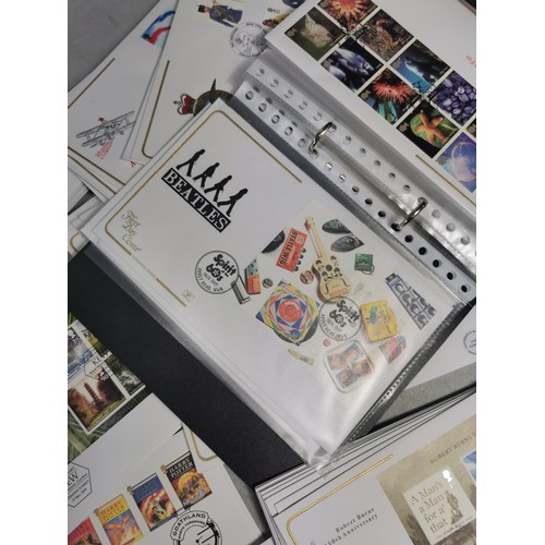 101 - Collection of 3x albums containing a quantity of first day covers along with a tin of loose stamps a... 