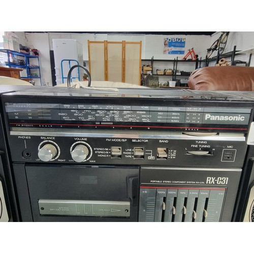 124 - A vintage Panasonic radio and cassette player with speakers in good order model no. RX-C31L
