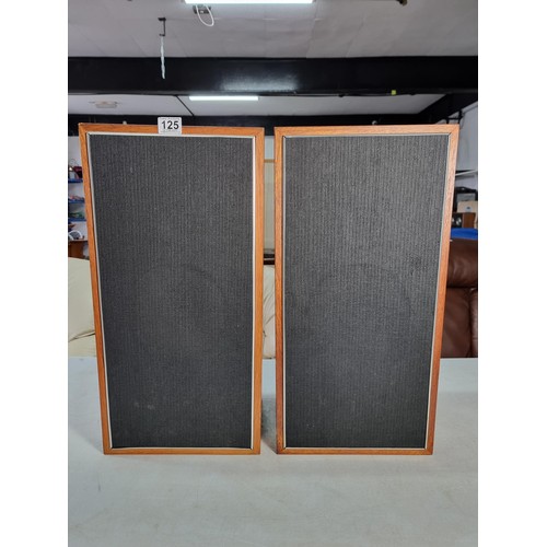 125 - Pair of large floor standing teak speakers in good overall condition with material covers to the fro... 