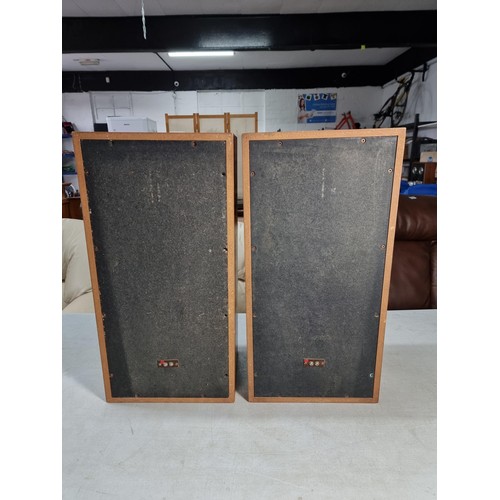 125 - Pair of large floor standing teak speakers in good overall condition with material covers to the fro... 
