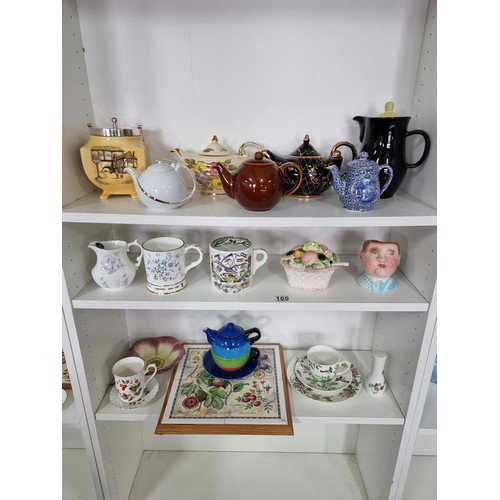 105 - Large quantity of collectable ceramics inc 4x teapots inc a black Arthur Wood teapot, a cream Aladdi... 