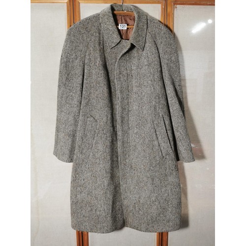 131 - A good quality long gents coat by Dunn and Co, Harris Tweed in good order 100% wool