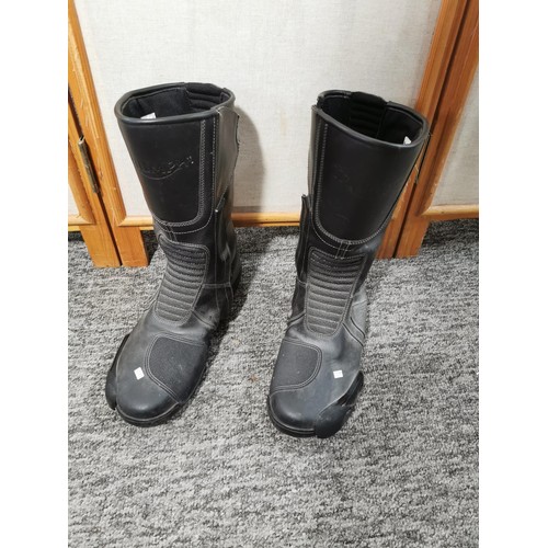 133 - A pair of SympaTex motorcycle boots size 44 along with a Lewis size 48 motorcycle jacket and a pair ... 