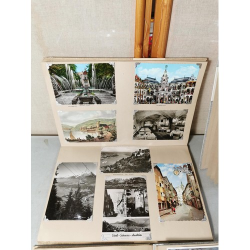 153 - A collection of vintage photographs and postcards inc a good quality reference book album with key e... 