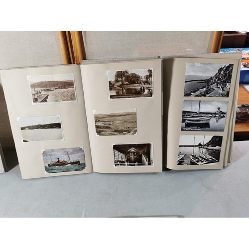 153 - A collection of vintage photographs and postcards inc a good quality reference book album with key e... 