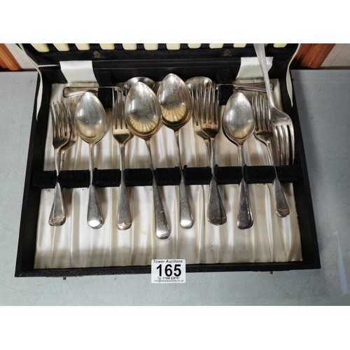 165 - A cased complete 6 person plated cutlery set by Winegartens inc teaspoons, knives, forks, salad fork... 