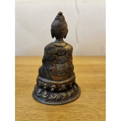 163 - A bronze Chinese senser and a Tibetan Buddha well detailed, a  Tibetan wax seal, and a Moroccan powd... 