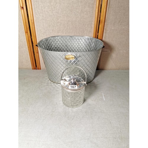 167 - A silver plated biscuit barrel in cut glass with lid along with a large Livivo champagne bucket all ... 