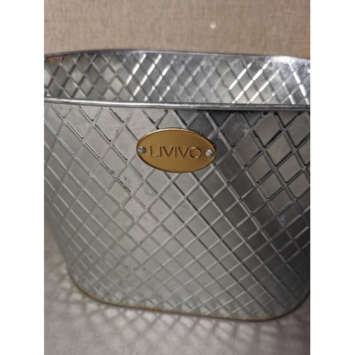 167 - A silver plated biscuit barrel in cut glass with lid along with a large Livivo champagne bucket all ... 