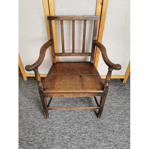 447 - A lovely quality antique Welsh solid elm carved country arm chair, the chair presents an excellent g... 