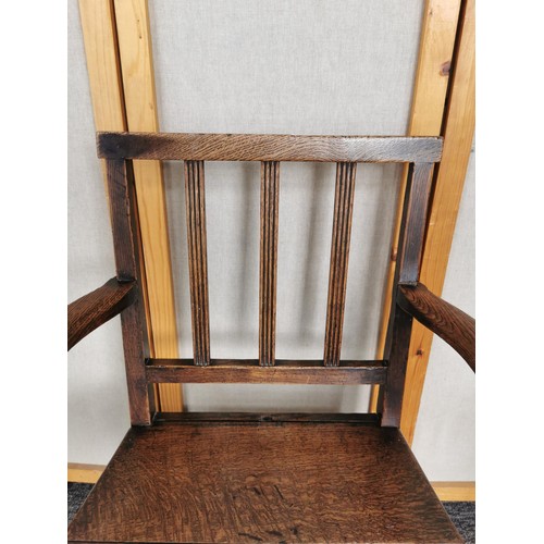 447 - A lovely quality antique Welsh solid elm carved country arm chair, the chair presents an excellent g... 