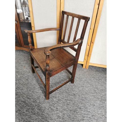 447 - A lovely quality antique Welsh solid elm carved country arm chair, the chair presents an excellent g... 